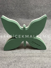 Küçük boutta kelebek şeklindeki oasis